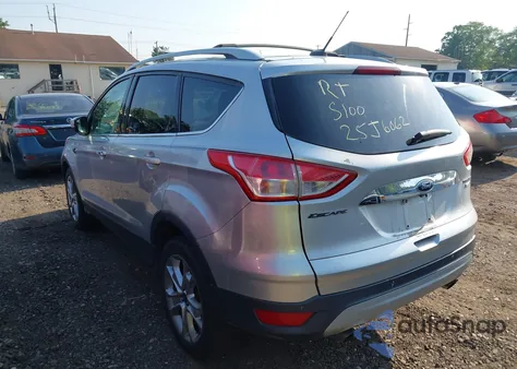 2014 Ford Escape Titanium z USA, uszkodzony, nr VIN 1FMCU9JX1EUB25280